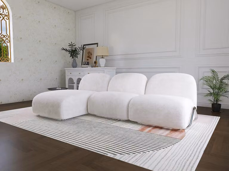 Biała narożna sofa w kształcie litery L, z drewnianą konstrukcją. Nowoczesne meble do salonu