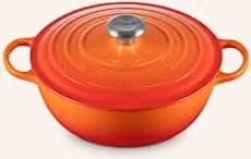 Brytfanna Le Creuset Signature wykonana z emaliowanego żeliwa w kolorze pomarańczowym